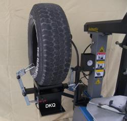DKQ Subsidiary tyre spreader